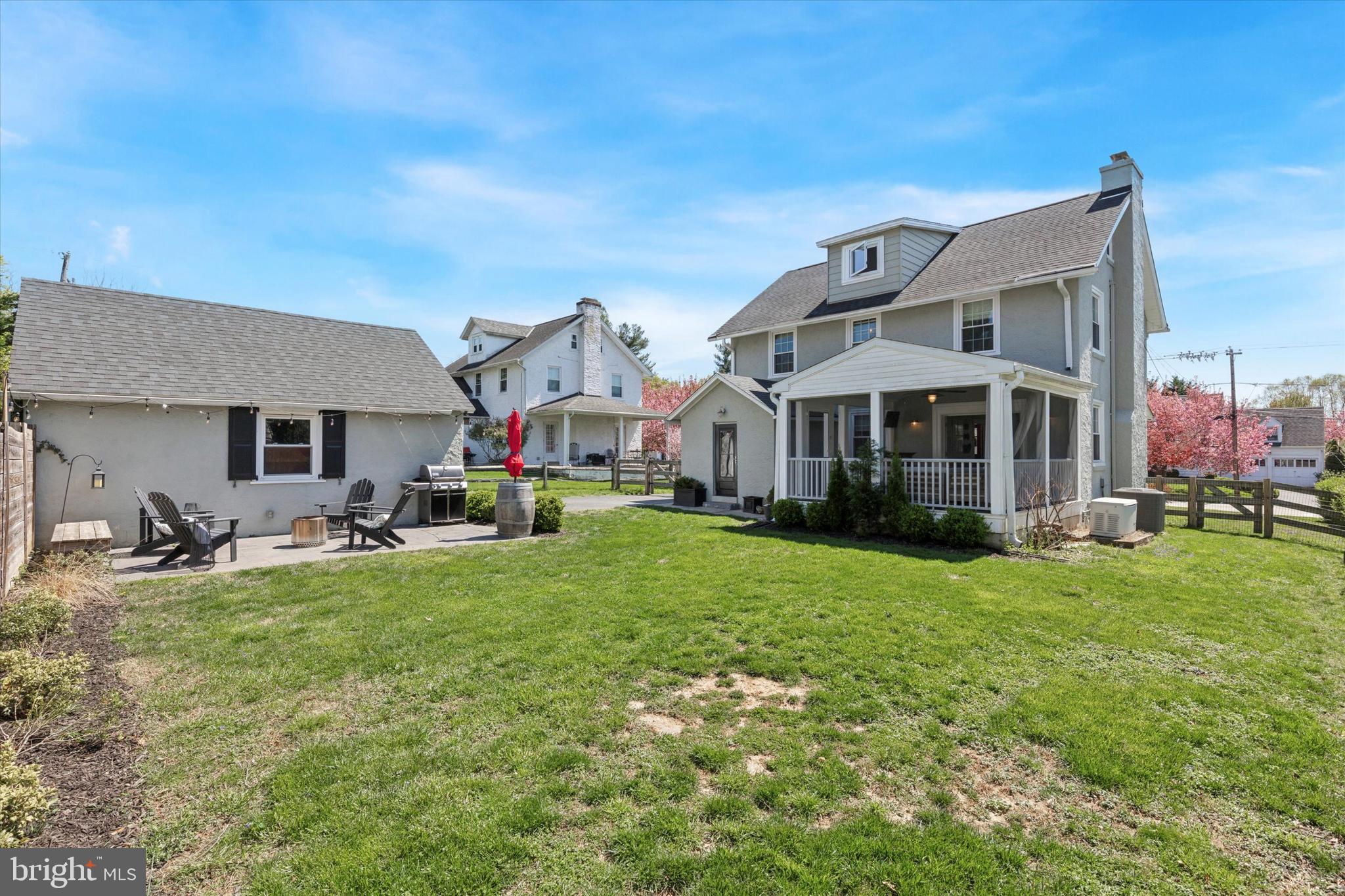403 Old Lancaster Road Berwyn, PA 19312 - Photo 41 of 41 a front view of house with yard barbeque and outdoor seating