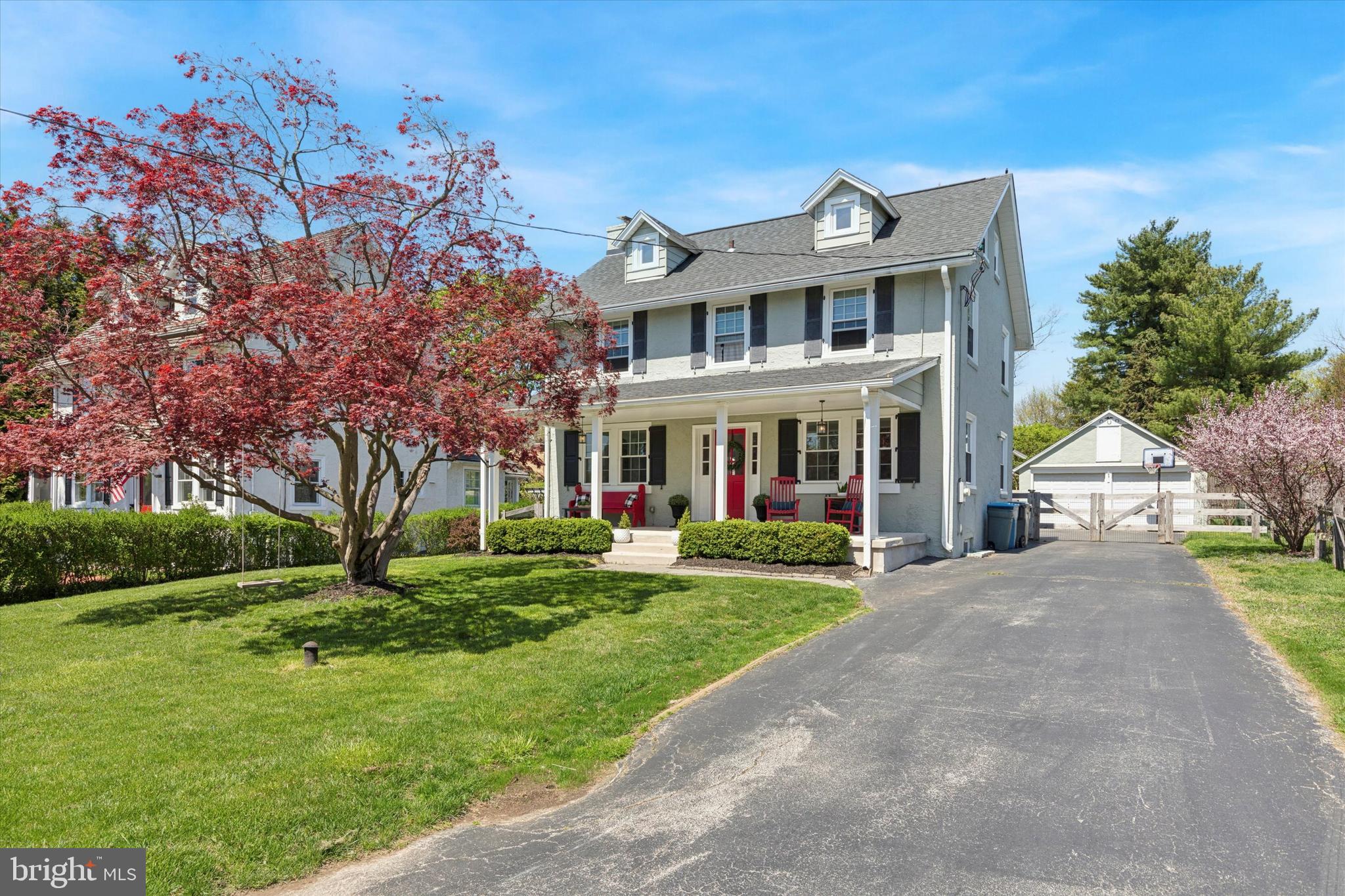 403 Old Lancaster Road Berwyn, PA 19312 - Photo 6 of 41 a front view of a house with a yard