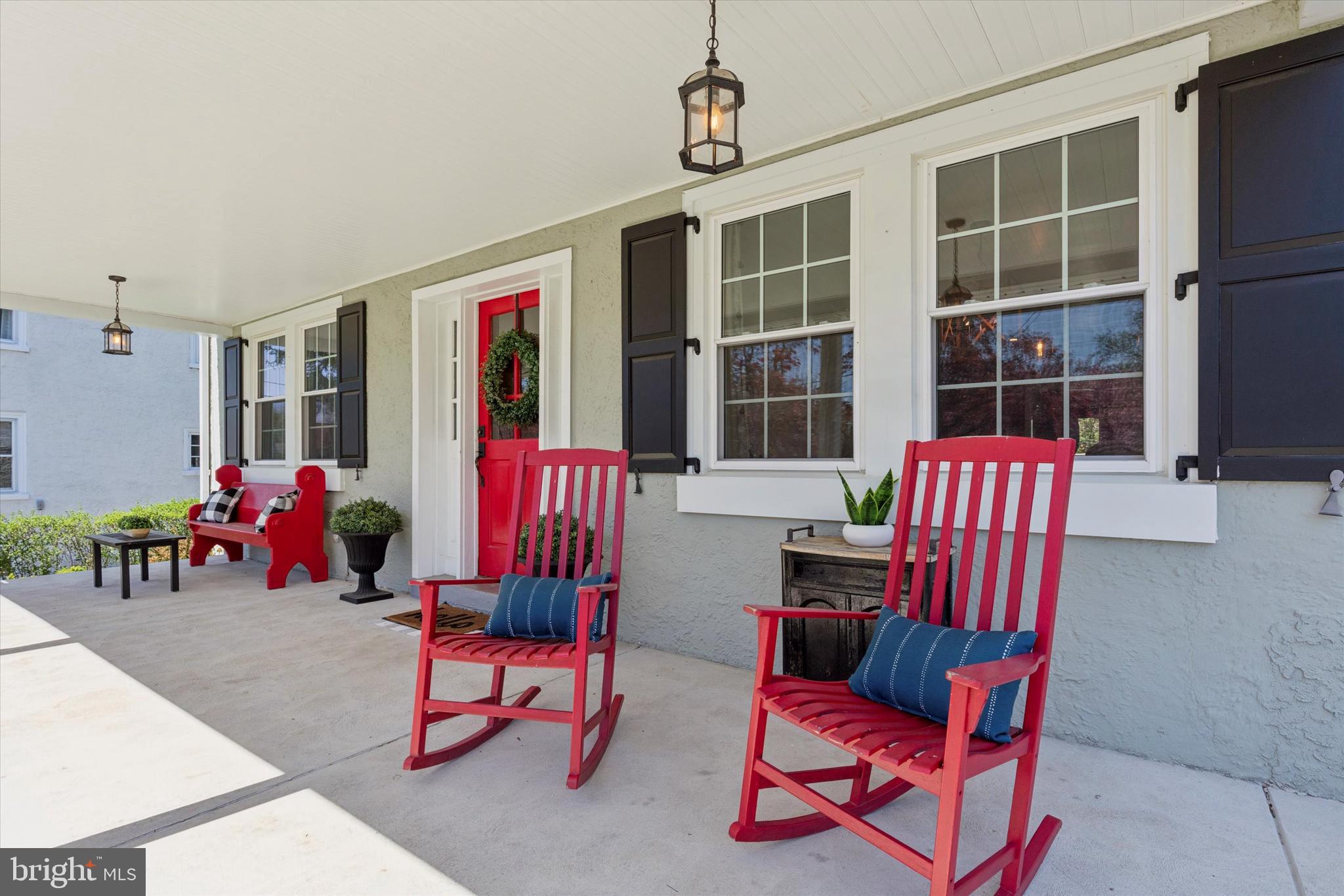 403 Old Lancaster Road Berwyn, PA 19312 - Photo 7 of 41 a living room with furniture and a flat screen tv
