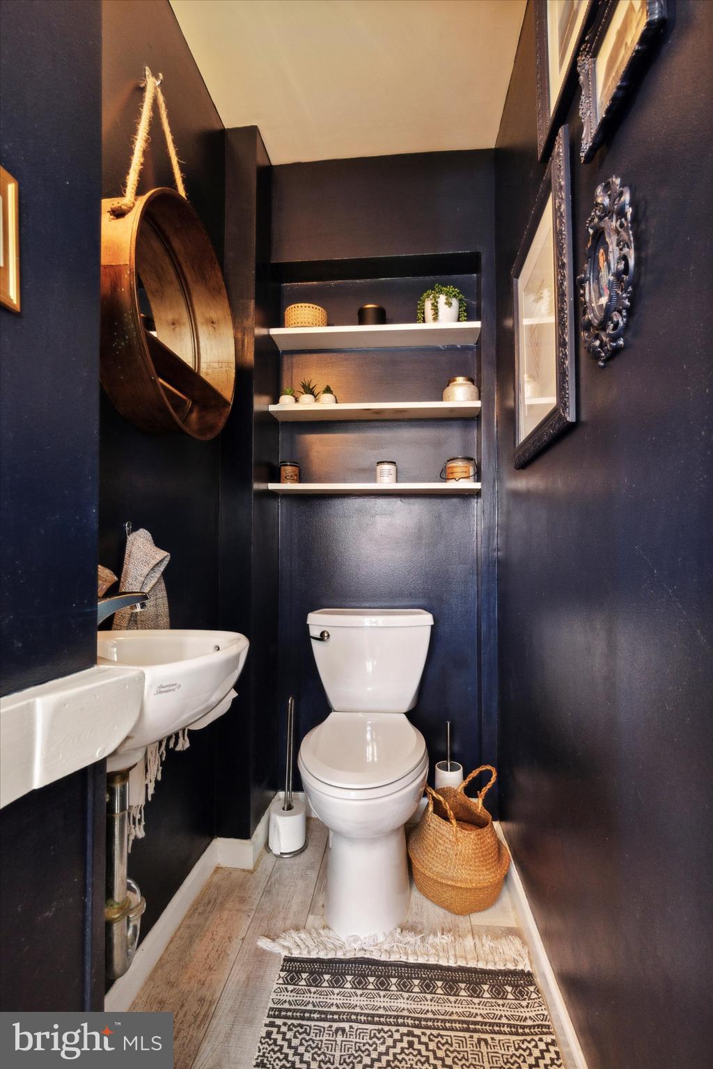 403 Old Lancaster Road Berwyn, PA 19312 - Photo 9 of 41 a bathroom with a toilet and a sink