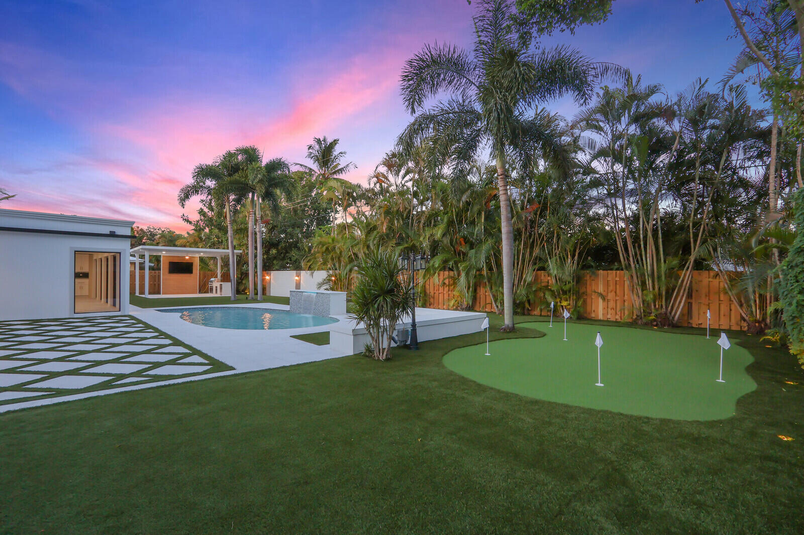 391 West Riverside Drive Tequesta, FL 33469 - Photo 5 of 52 05_Twilight_5_mls
