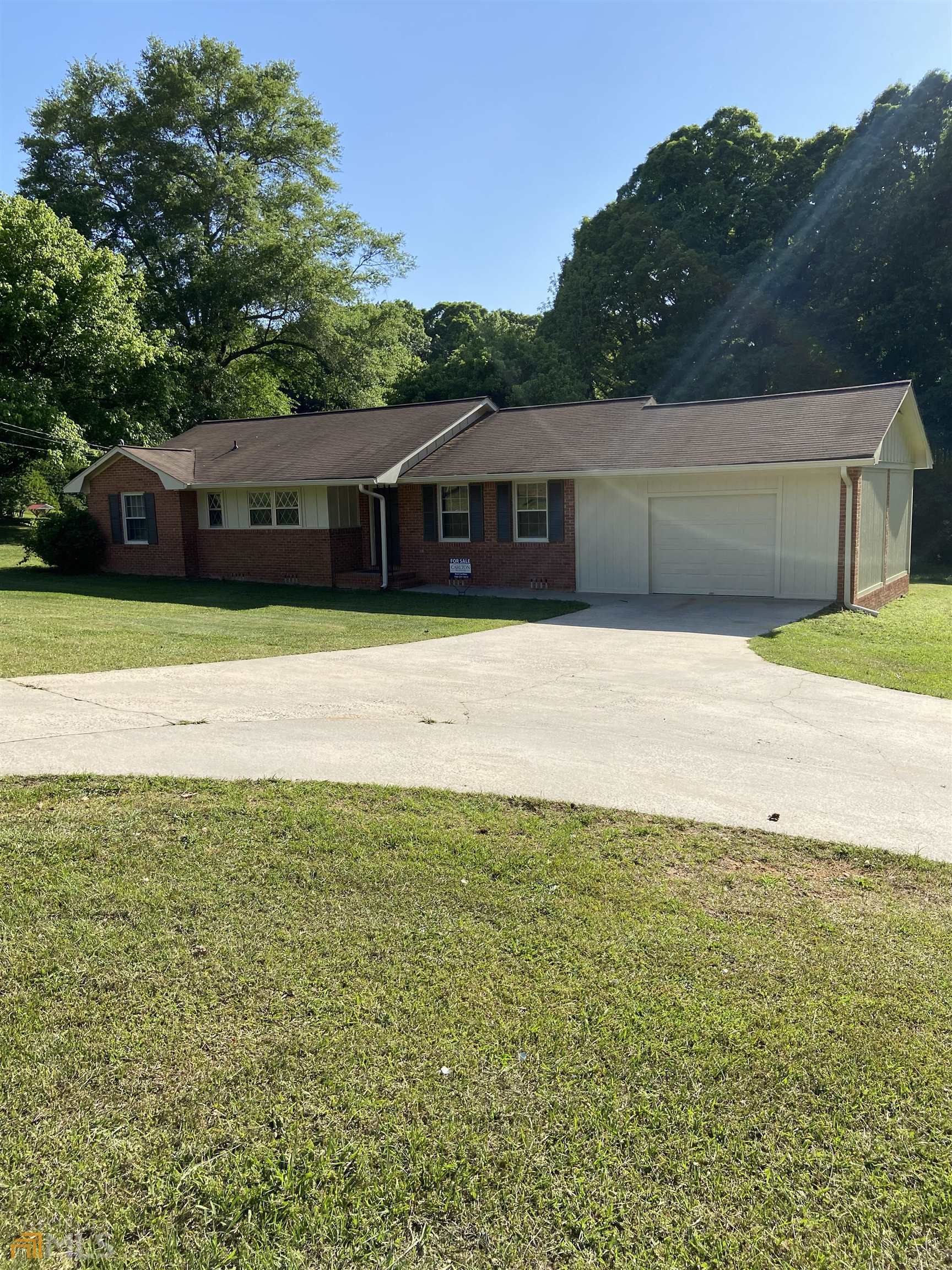 1029 Prospect Road Rockmart, GA 30153 - Photo 1 of 1 a front view of a house with a yard
