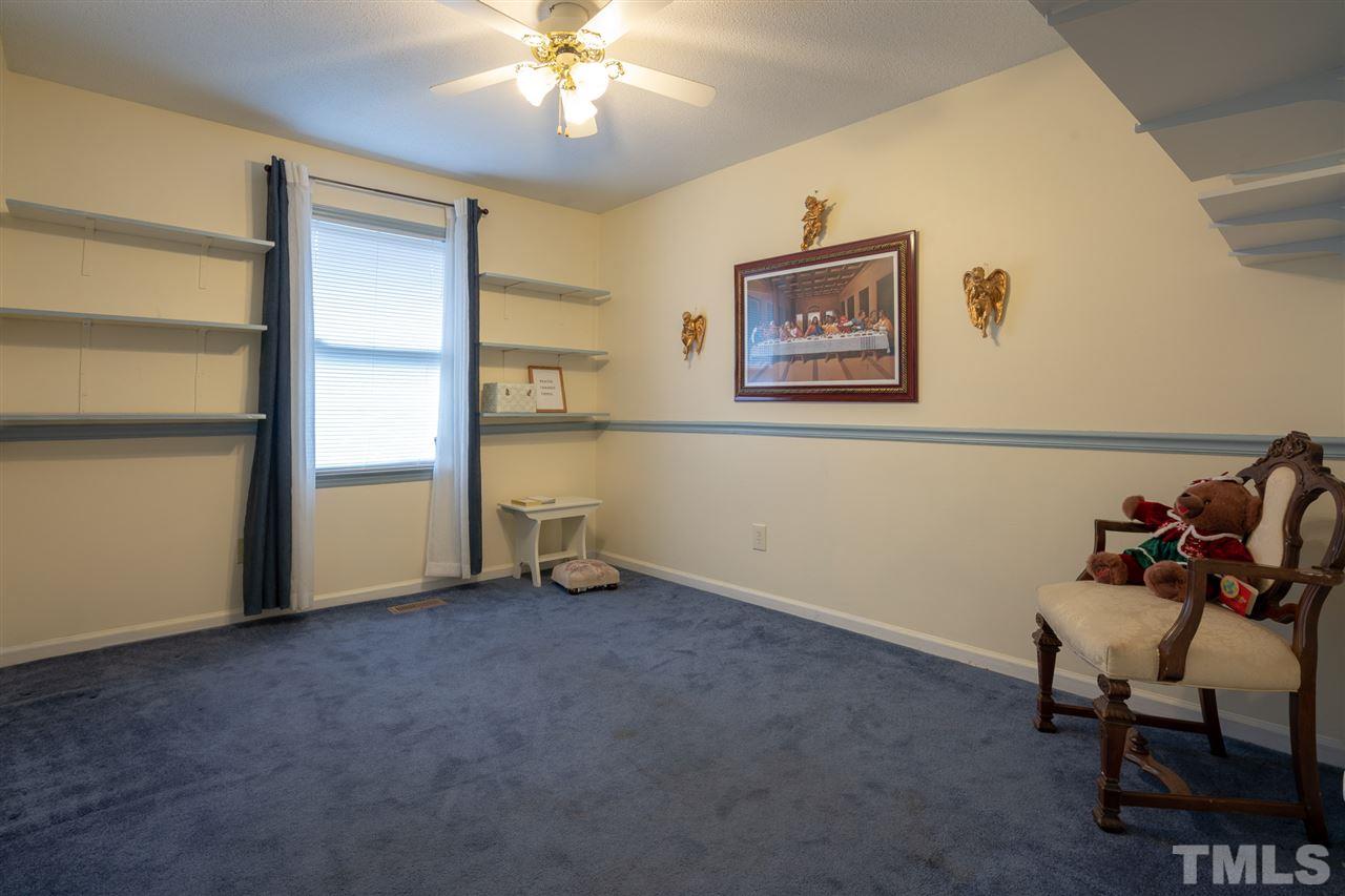 3411 Freeman Road Durham, NC 27703 - Photo 18 of 24 a view of room with workspace and windows