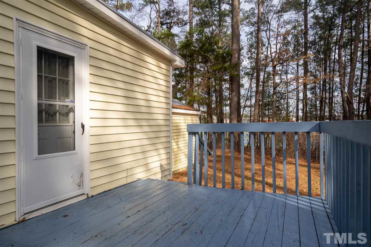 3411 Freeman Road Durham, NC 27703 - Photo 22 of 24 a view of a balcony with wooden floor