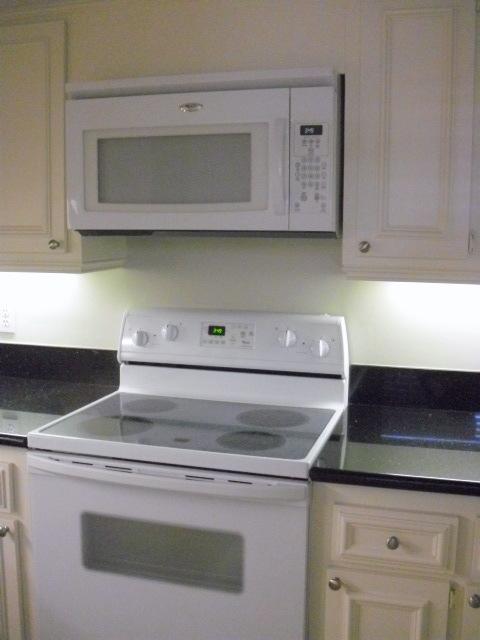 11 Concourse Drive, Unit 11A Tequesta, FL 33469 - Photo 16 of 54 Newer Range and Microwave