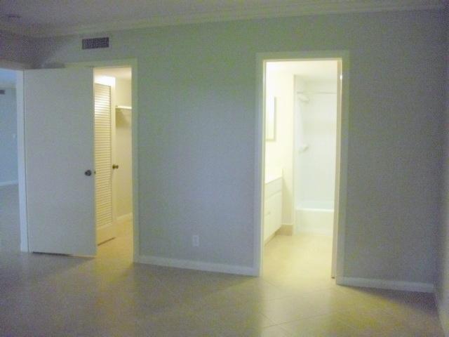 11 Concourse Drive, Unit 11A Tequesta, FL 33469 - Photo 22 of 54 Master: Bath and Closet Door Entries