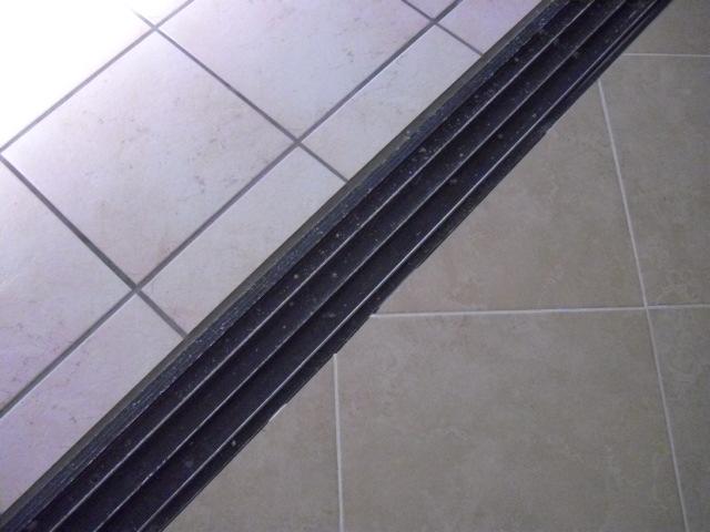 11 Concourse Drive, Unit 11A Tequesta, FL 33469 - Photo 40 of 54 Tile Floor Living Room to Patio