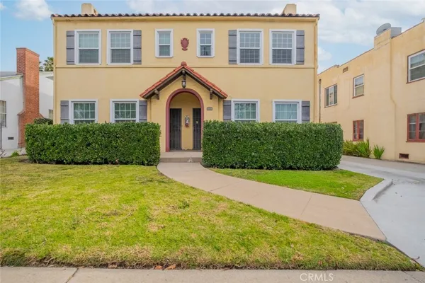 a view of a car in front of a house