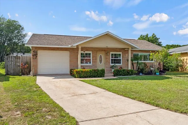 a front view of a house with yard