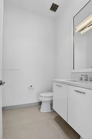 a white bath tub sitting in a bathroom