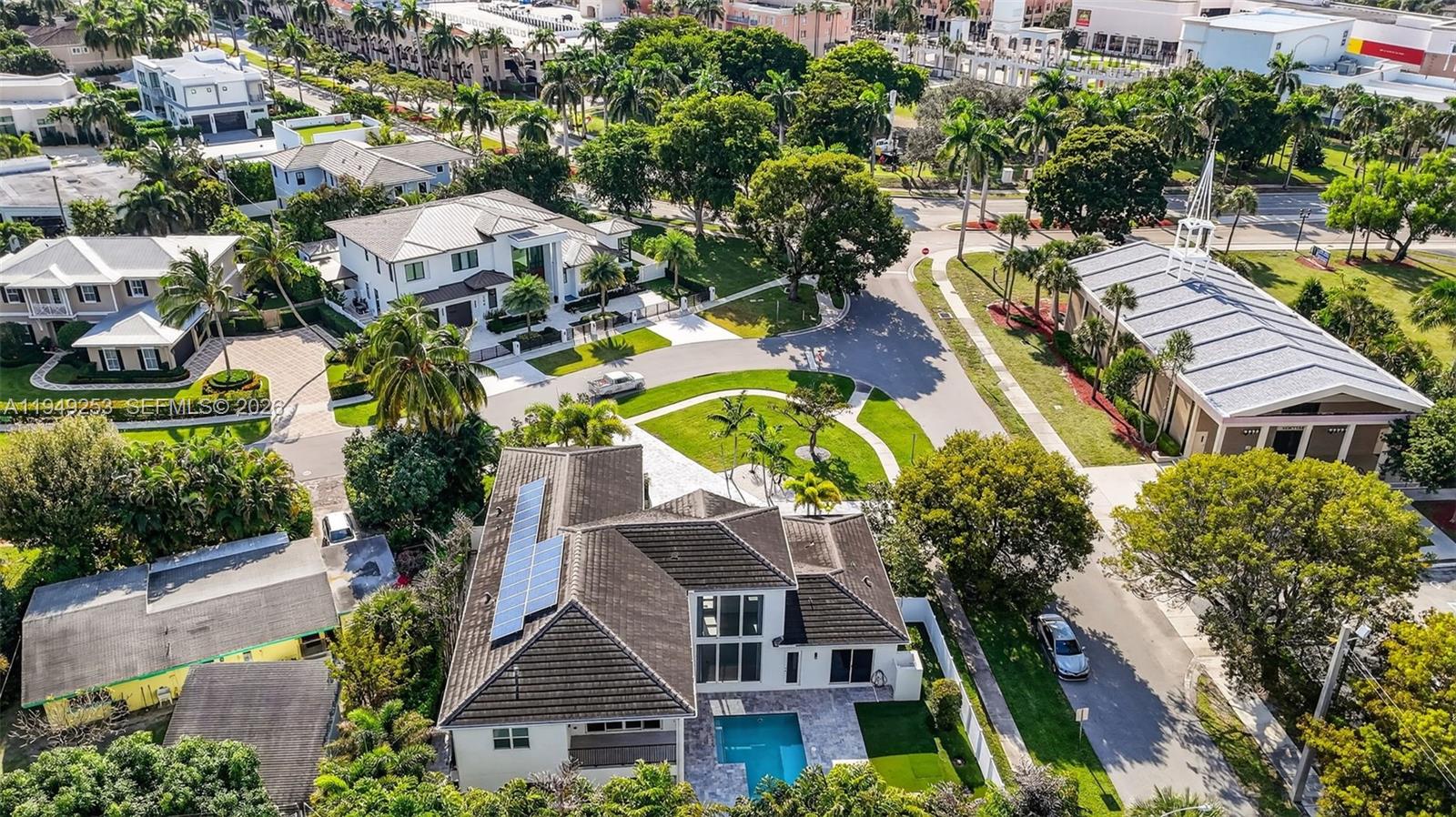 201 Northeast 6th Street Boca Raton, FL 33432 - Photo 99 of 100 a aerial view of a house with a yard and potted plants