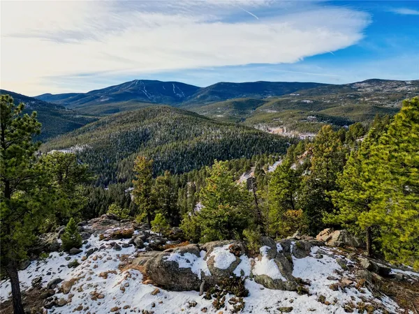 a view of mountain with outdoor space