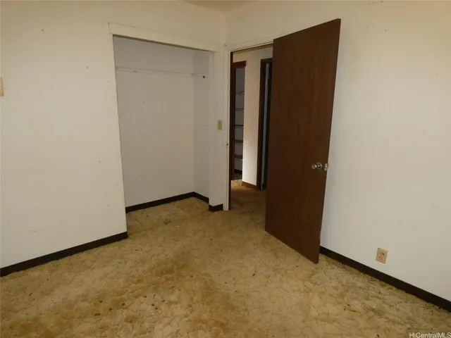 an empty room with closet