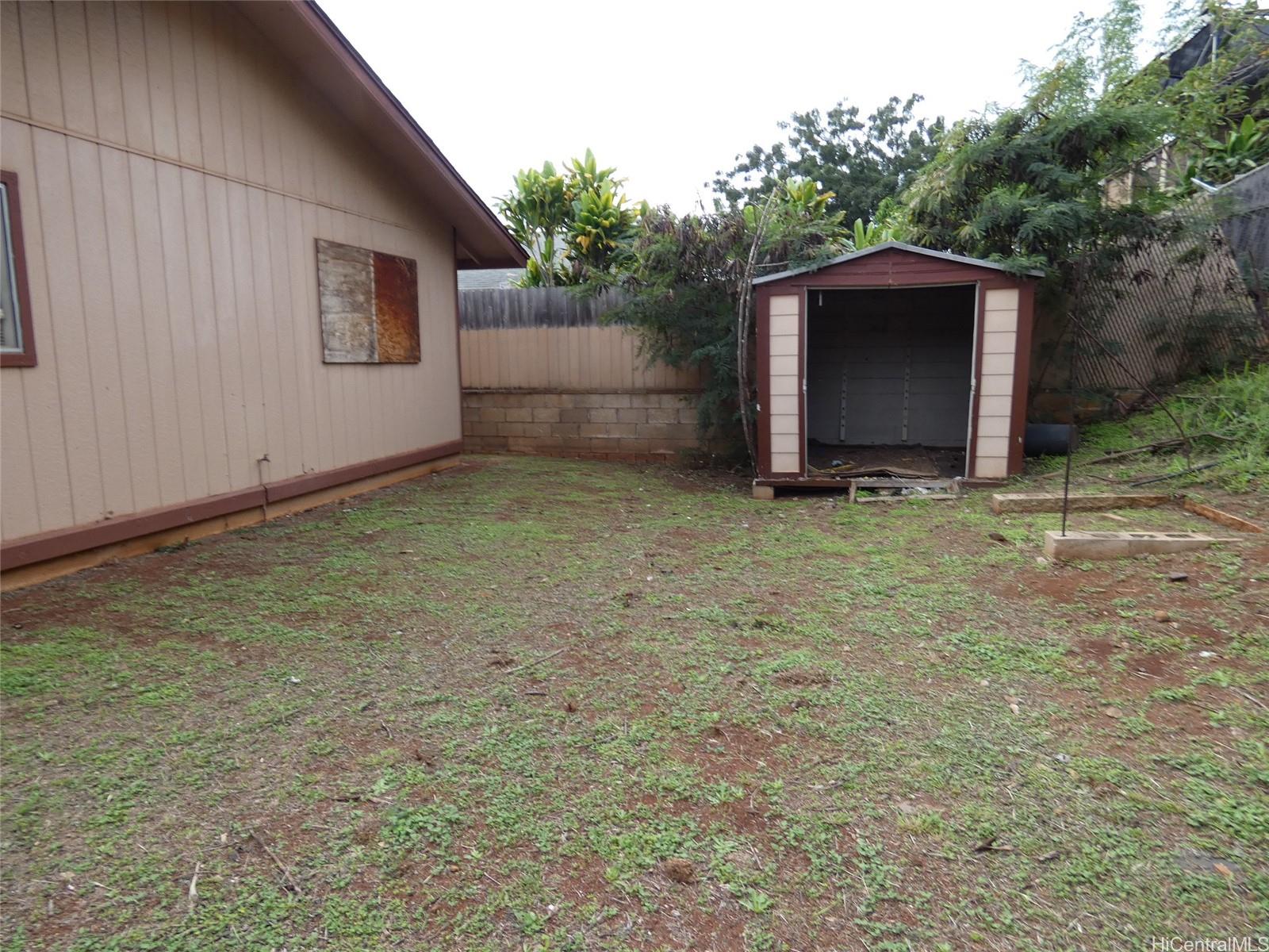 94-605 Kupuna Loop Waipahu, HI 96797 - Photo 10 of 12 a view of a backyard