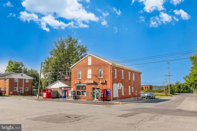 a view of a parked cars in front of a building