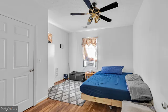 a bathroom with a toilet sink and shower