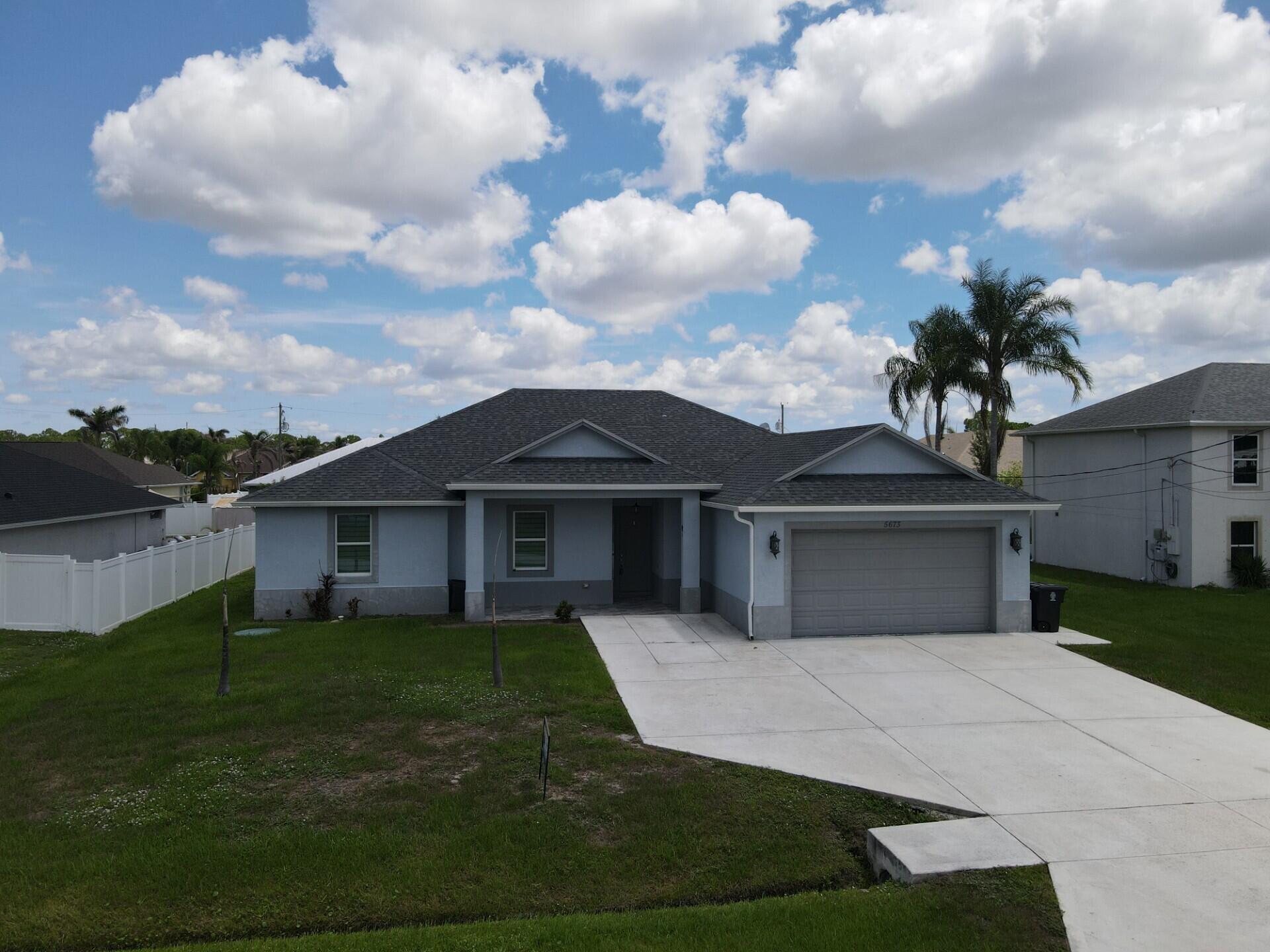 5673 Northwest Whitecap Road Port St. Lucie, FL 34986 - Photo 2 of 31 6fe25858-3cb1-40ff-8bec-64ebd79d782e