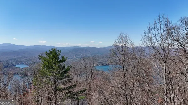 a view of mountain with sunset view