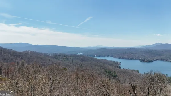 a view of lake with mountain