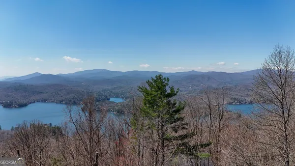 a view of a lake with mountains in the background