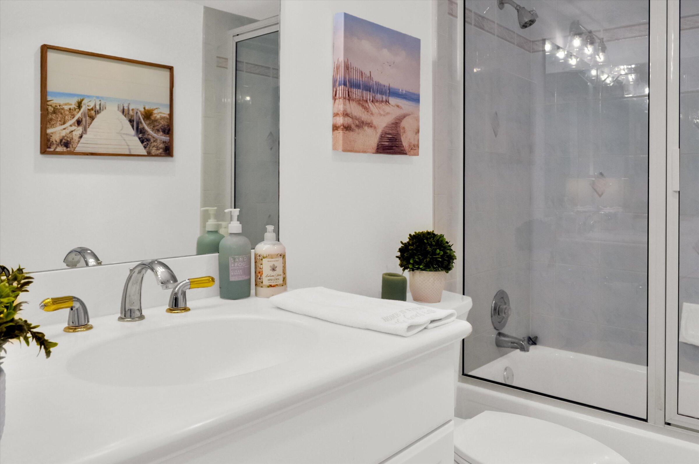 400 Ocean Trail Way, Unit 703 Jupiter, FL 33477 - Photo 32 of 63 a bathroom with a sink and a mirror