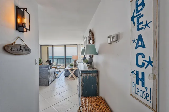 a kitchen with stainless steel appliances granite countertop a refrigerator and a stove