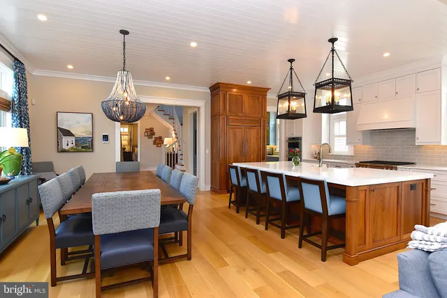 a bathroom with a granite countertop sink toilet and a mirror