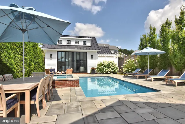 a view of a balcony with wooden floor