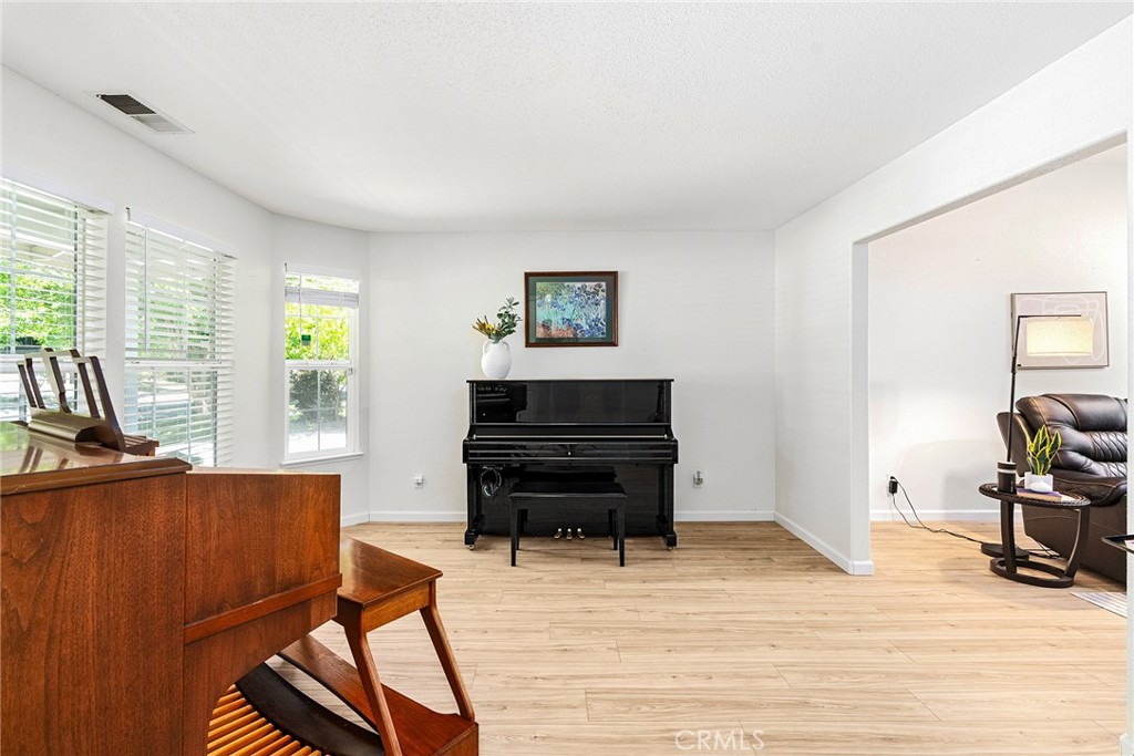 3011 Calistoga Drive Chico, CA 95973 - Photo 17 of 40 a living room with furniture and a flat screen tv