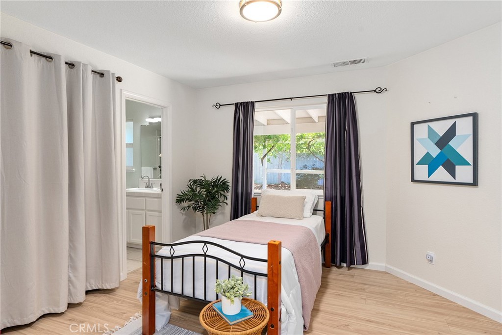 3011 Calistoga Drive Chico, CA 95973 - Photo 18 of 40 a view of a bedroom from a hallway