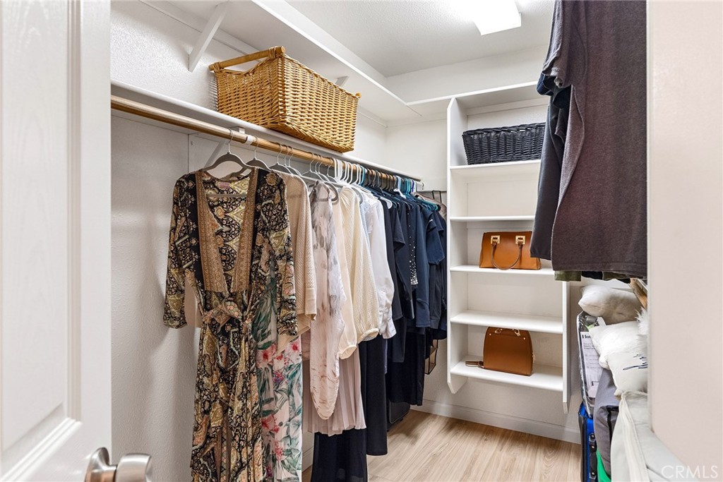 3011 Calistoga Drive Chico, CA 95973 - Photo 22 of 40 a view of walk in closet with clothes and shoes