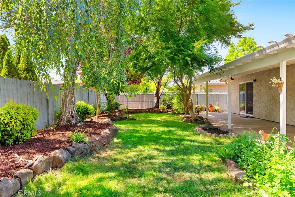 3011 Calistoga Drive Chico, CA 95973 - Photo 31 of 40 a view of a house with backyard and sitting area