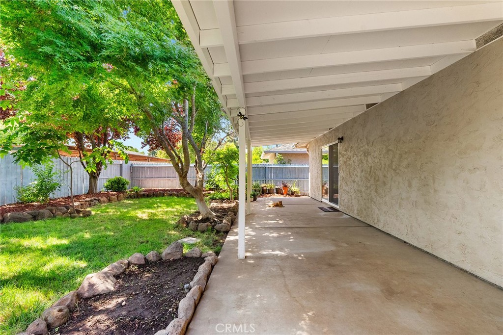 3011 Calistoga Drive Chico, CA 95973 - Photo 33 of 40 a view of a patio with table and chairs and potted plants