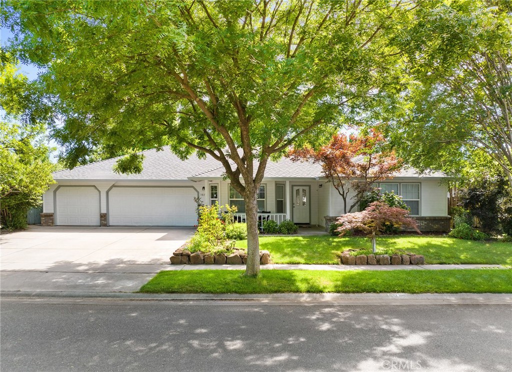 3011 Calistoga Drive Chico, CA 95973 - Photo 37 of 40 a white house that has a tree in front of it