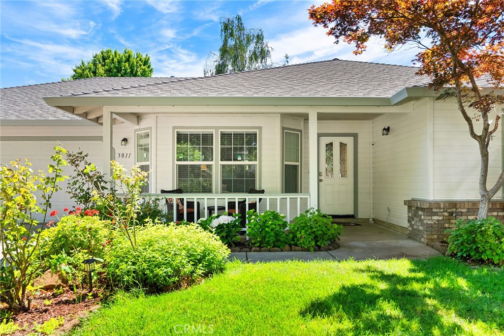 3011 Calistoga Drive Chico, CA 95973 - Photo 7 of 40 a front view of a house with garden