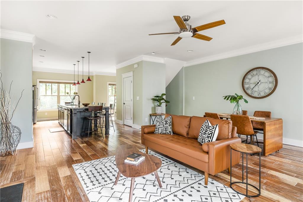1333 Oakview Road Decatur, GA 30030 - Photo 5 of 28 a living room with furniture a rug and a clock