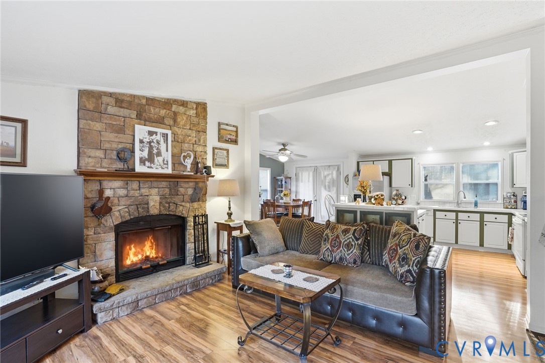 11621 Mapsico Road Charles City, VA 23030 - Photo 13 of 36 a living room with furniture and a fireplace