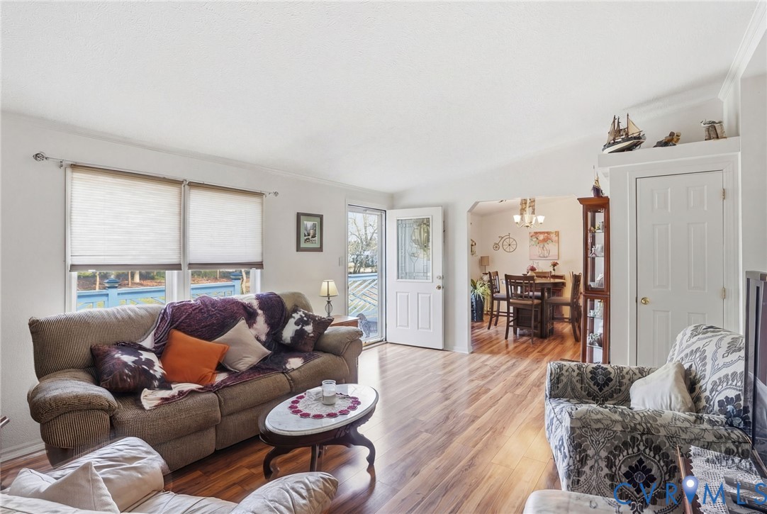 11621 Mapsico Road Charles City, VA 23030 - Photo 4 of 36 a living room with furniture and wooden floor