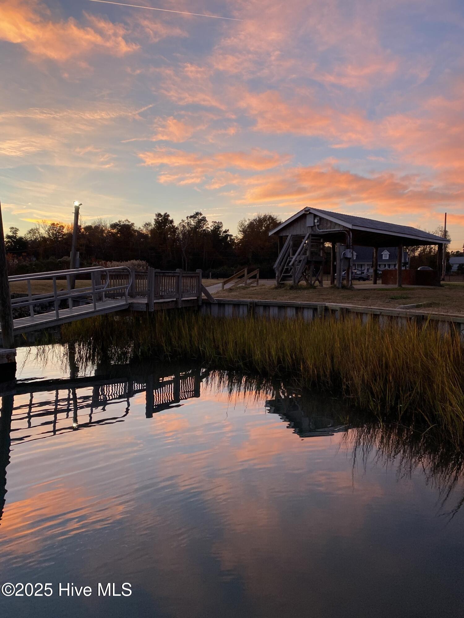 406 Hughes Road Hampstead, NC 28443 - Photo 81 of 83 Sunset at the boat dock