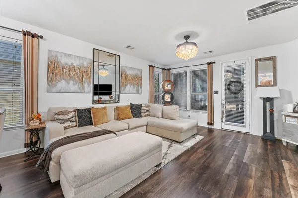 a view of dresser with window