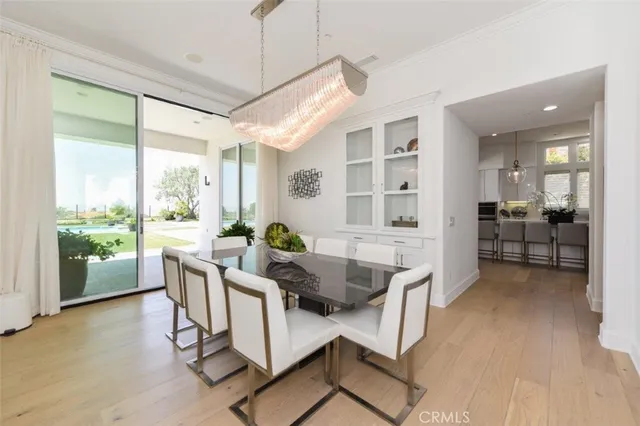 a kitchen with stainless steel appliances a stove a sink and a counter space