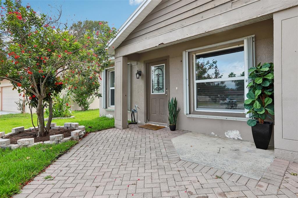 1525 Kestrel Way Brandon, FL 33511 - Photo 6 of 48 a view of a brick house with a large windows