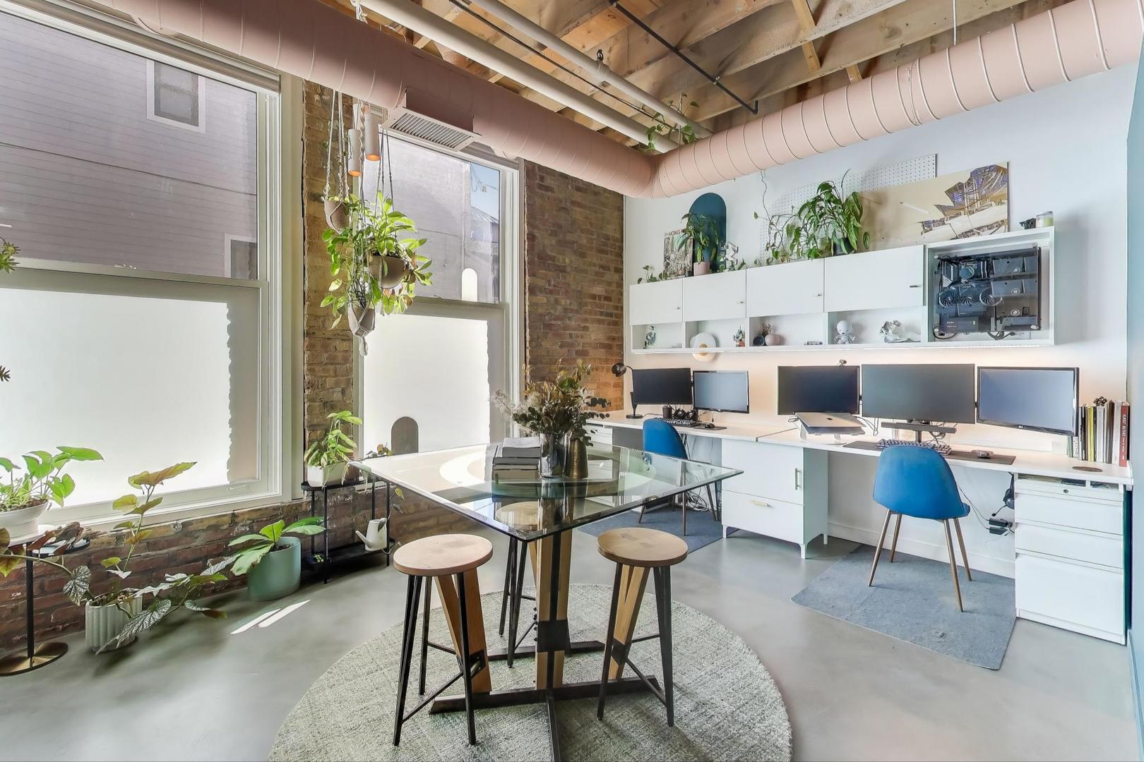5235 North Ravenswood Avenue, Unit 3 Chicago, IL 60640 - Photo 17 of 27 a living room with furniture and a table