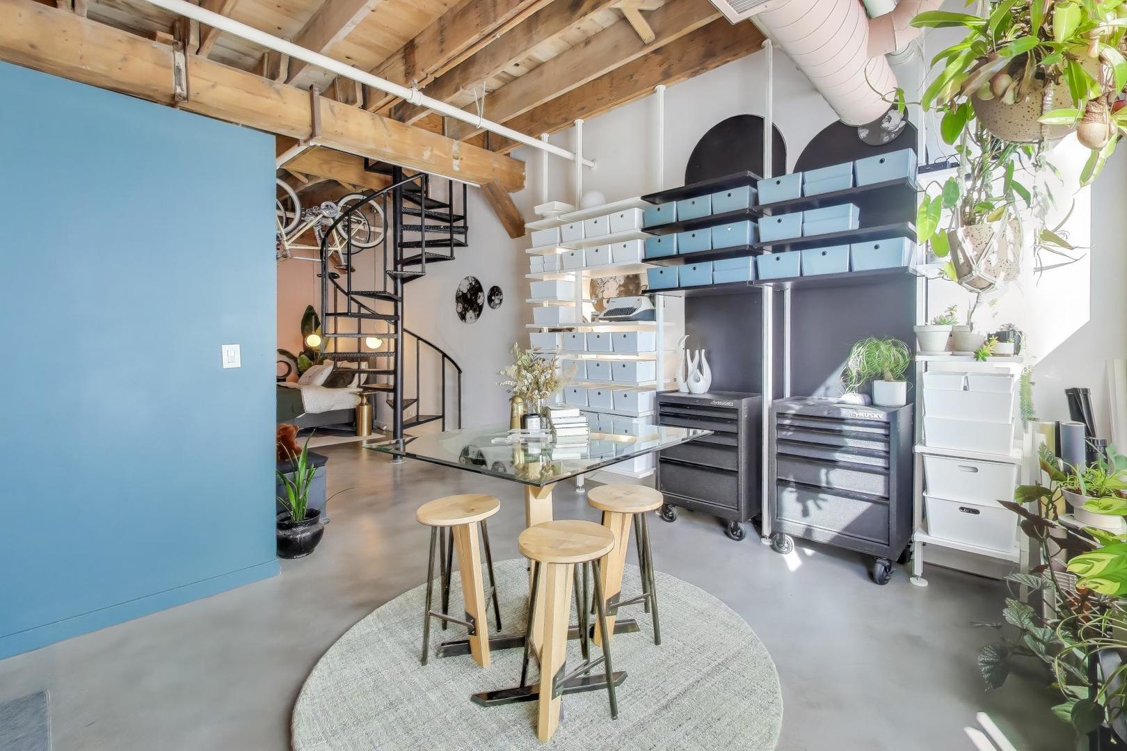 5235 North Ravenswood Avenue, Unit 3 Chicago, IL 60640 - Photo 18 of 27 a dining room with furniture and a wooden floor