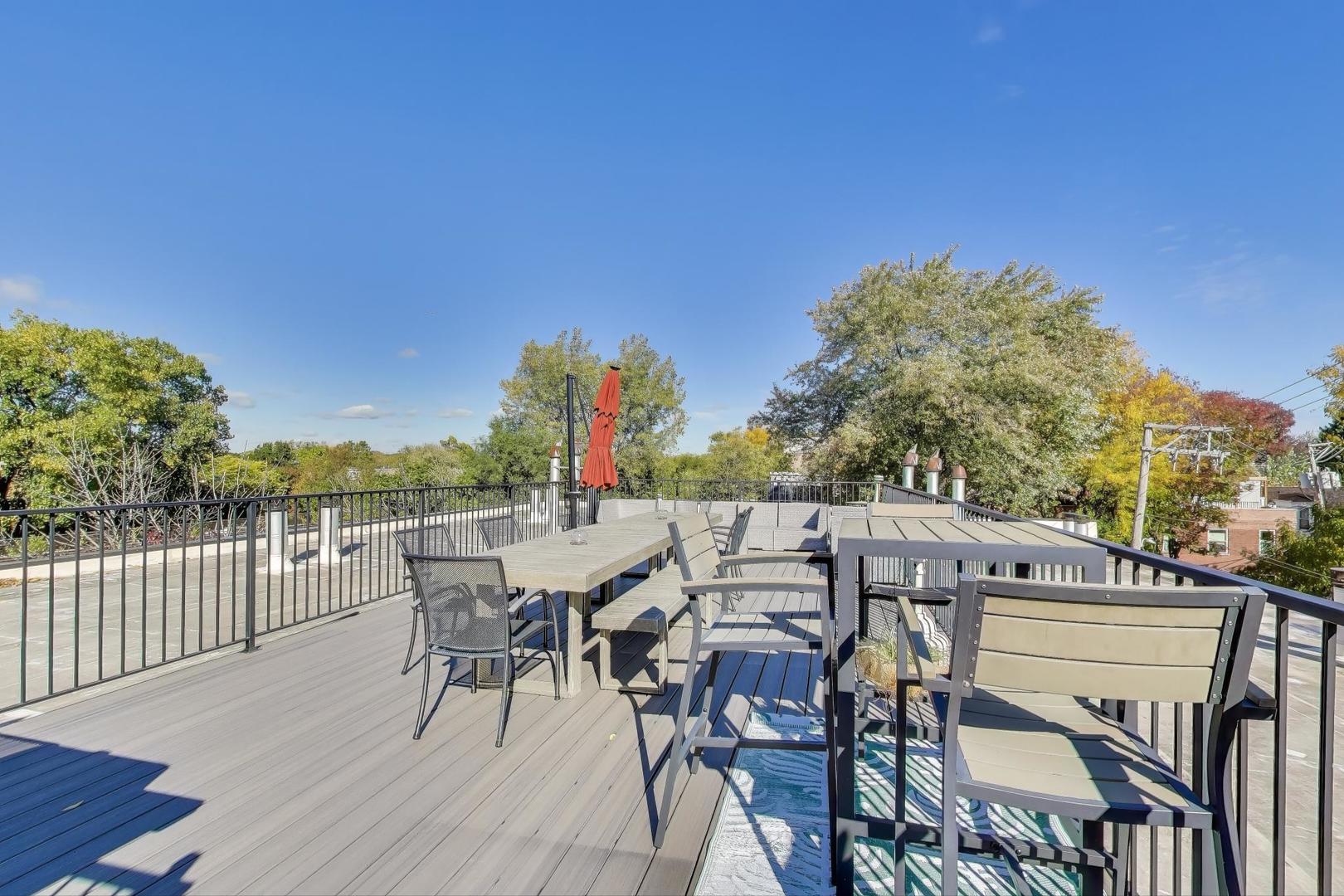 5235 North Ravenswood Avenue, Unit 3 Chicago, IL 60640 - Photo 21 of 27 a view of a terrace with furniture and outdoor space