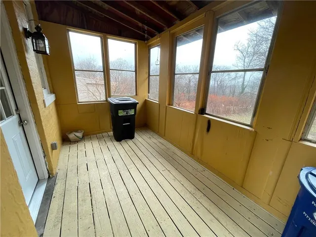 a view of a house with wooden floor