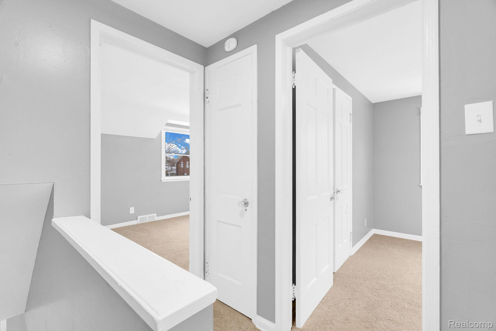 10808 Nottingham Road Detroit, MI 48224 - Photo 14 of 26 Hall featuring light carpet and baseboards