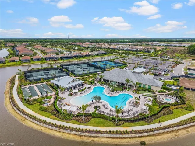 a view of a swimming pool with a lake view