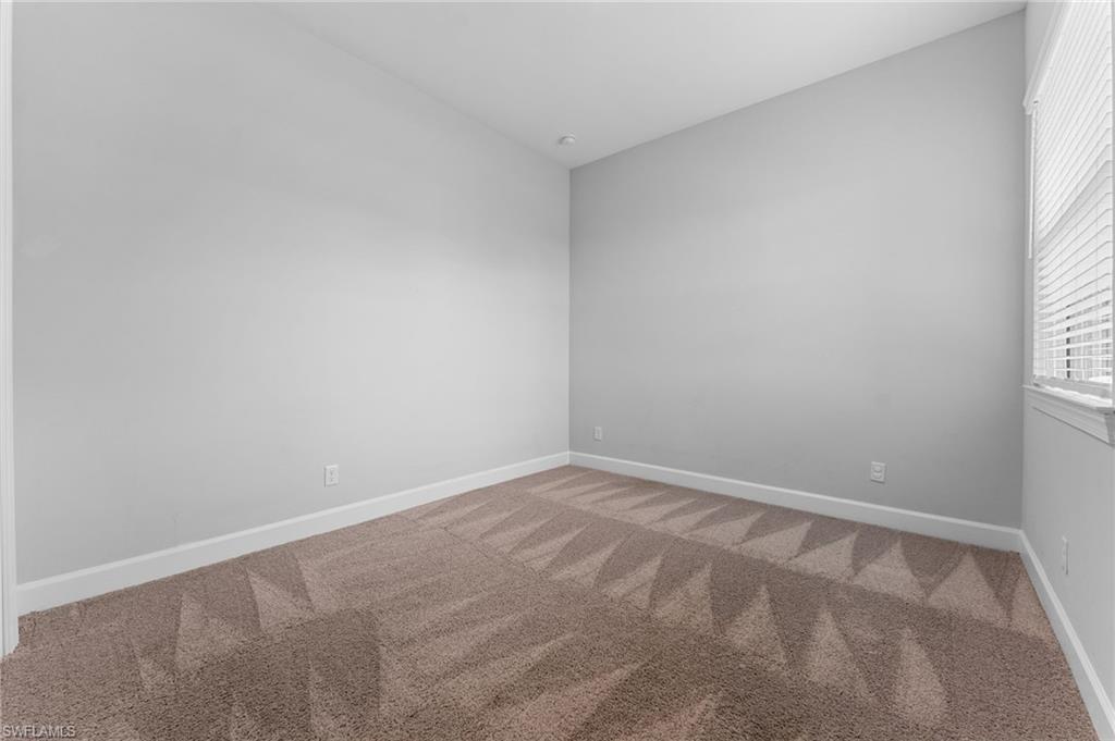 15244 Zeno Way, Unit 201 Naples, FL 34114 - Photo 43 of 48 a view of an empty room and window
