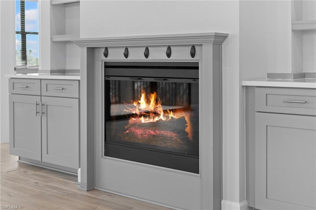 15244 Zeno Way, Unit 201 Naples, FL 34114 - Photo 44 of 48 a view of fireplace in microwave